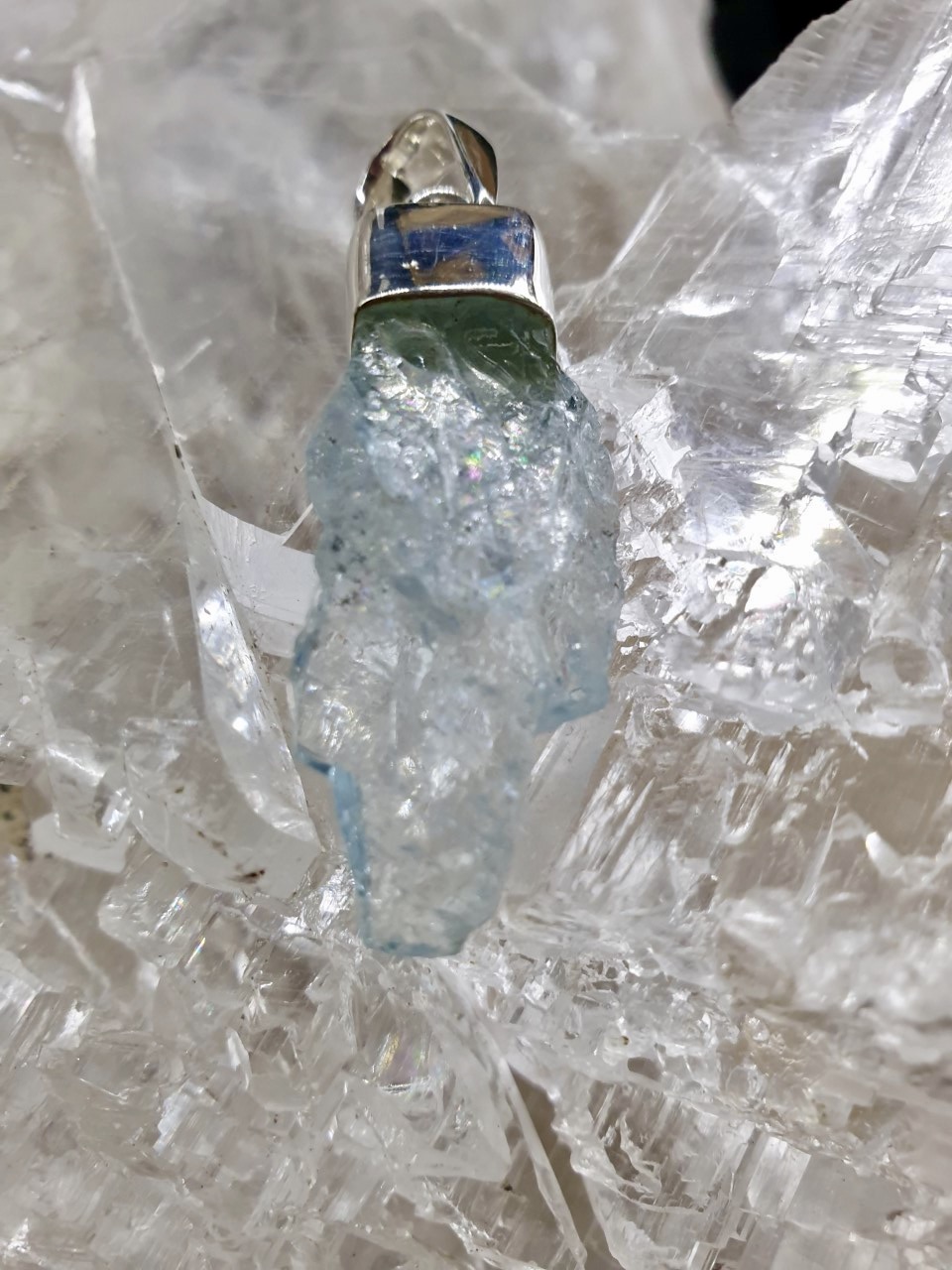 Aquamarine Raw with Rainbow Silver Pendant • The Crystal Cave