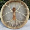 shamanic air pump drum with lion carved handle and goat skin. thecrystalcave.com.au