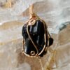This is a Black Tourmaline wire wrapped pendant-a powerful protector. Used for eons by Magicians and Shaman to protect from negative Spirits and Demons. thecrystalcave.com.au