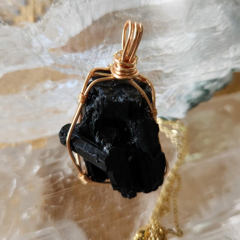 This is a Black Tourmaline wire wrapped pendant-a powerful protector. Used for eons by Magicians and Shaman to protect from negative Spirits and Demons. thecrystalcave.com.au