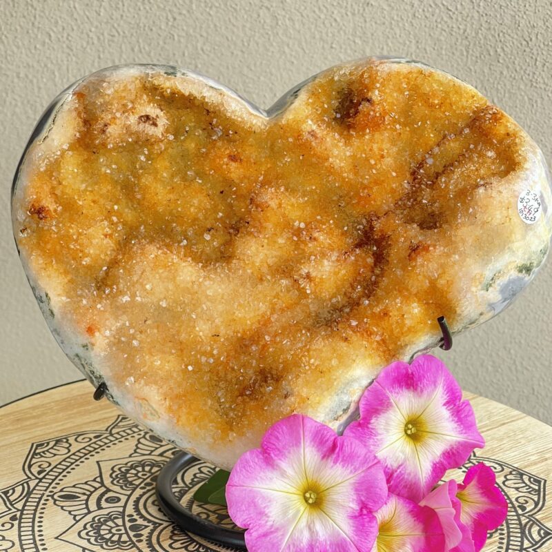 A magnificent Citrine carved heart, to enhance your home or office. Providing abundance of wealth, love, and health in all areas of your life. thecrystalcave.com.au