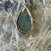 This is a beautiful Labradorite cabochon pendant in Stirling silver. thecrystalcave.com.au