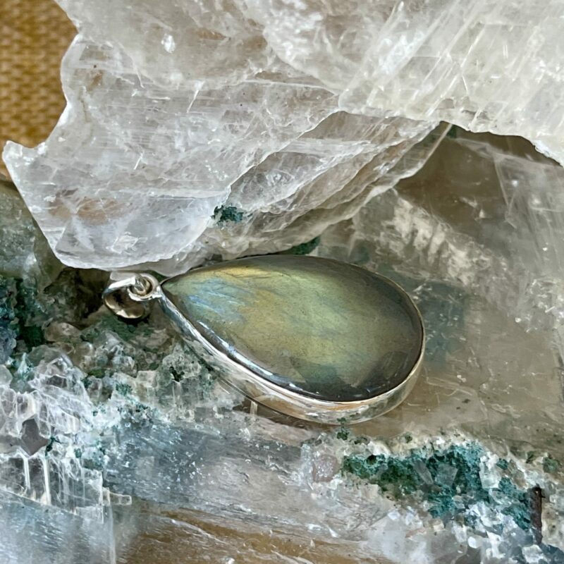 This is a beautiful Labradorite cabochon pendant in Stirling silver. thecrystalcave.com.au