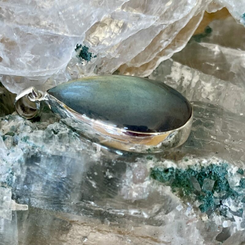 This is a beautiful Labradorite cabochon pendant in Stirling silver. thecrystalcave.com.au