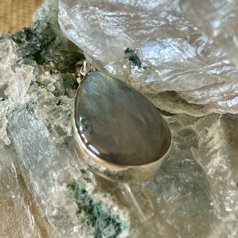 This is a beautiful Labradorite cabochon pendant in Stirling silver. thecrystalcave.com.au