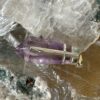 This is an Amethyst pendant. It has deep clear colour and is particularly beautiful. set in stirling silver. It is both protective and connective. thecrystalcave.com.au