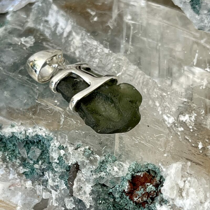 This is a beautiful moldavite 925 sterling silver pendant. Wear it daily. thecrystalcave.com.au