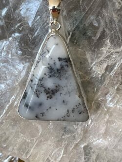 This is a Mystic Merlinite set in 927 silver pendant. Its energy opens the doorways of magic and ritual. Favoured for centuries by Druids and Shaman alike, its protective energies are revered, as it deflects negative energies.  thecrystalcave.com.au