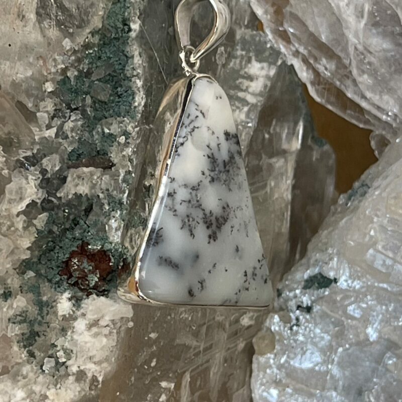 This is a Mystic Merlinite set in 927 silver pendant. Its energy opens the doorways of magic and ritual. Favoured for centuries by Druids and Shaman alike, its protective energies are revered, as it deflects negative energies.  thecrystalcave.com.au