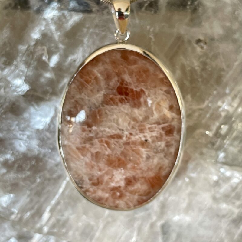 this is an oval sunstone pendant set in 925 stirling silver. it is quite beautiful. Sunstone is a stone of joy. thecrystalcave.com.au