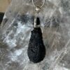 Beautiful Tektite pendant set in sterling silver teardrop shape