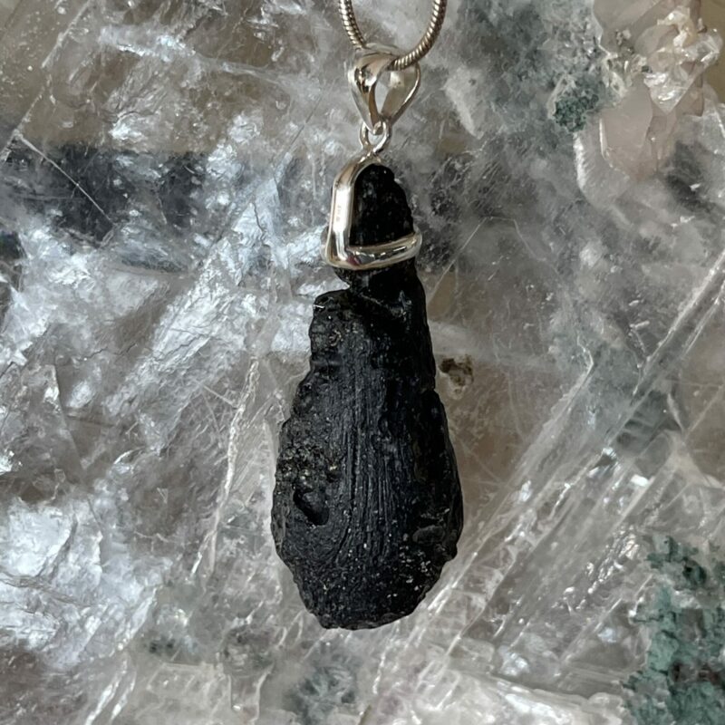 Beautiful Tektite pendant set in sterling silver teardrop shape