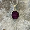 This Ruby Slice set in 925 silver is a beautiful pendant. Courage, love and compassion thecrystalcave.com.au