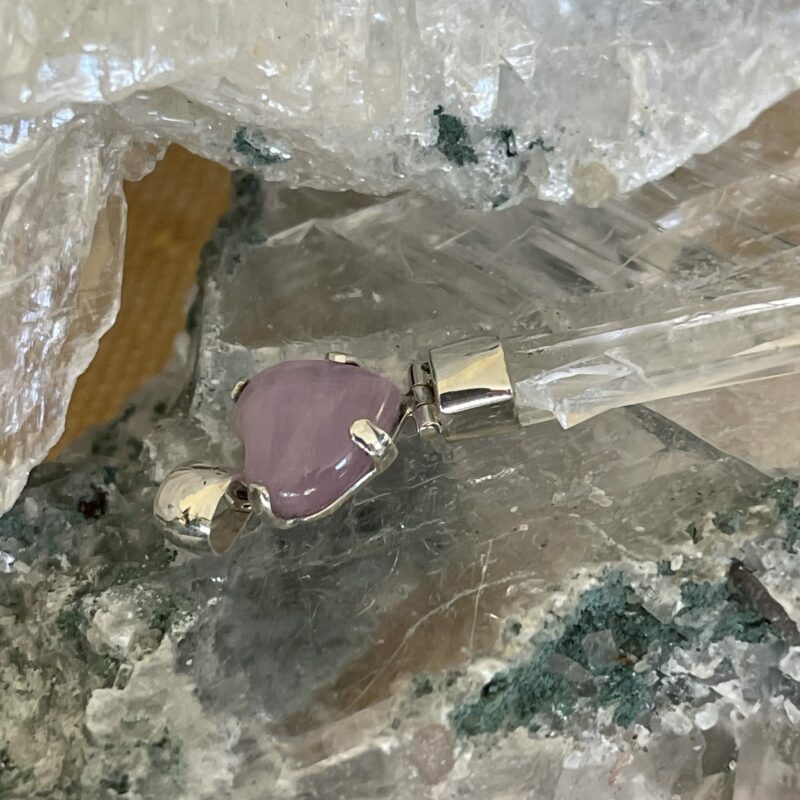 This is a Kunzite Heart and Colombian Lemurian or Blade of Light in 925 Silver pendant. Delicious to see, beautiful to wear. thecrystalcave.com.au