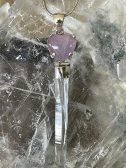 This is a Kunzite Heart and Colombian Lemurian or Blade of Light in 925 Silver pendant. Delicious to see, beautiful to wear. thecrystalcave.com.au