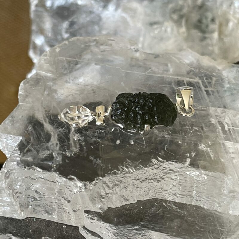 this is magnificent moldavite with herkimer diamond silver pendant thecrystalcave.com.au