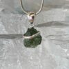 this is magnificent moldavite silver pendant thecrystalcave.com.au