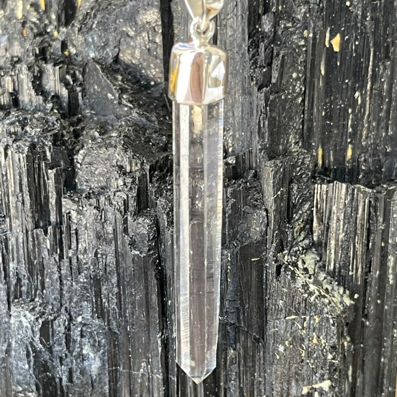 This is a Colombian Lemurian 'Blade of Light' pendant set in 925 silver. Water clear they are high vibrational stones, clarity and joy. thecrystalcave.com.au