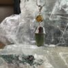 this is beautiufl moldavite with golden rutile silver pendant