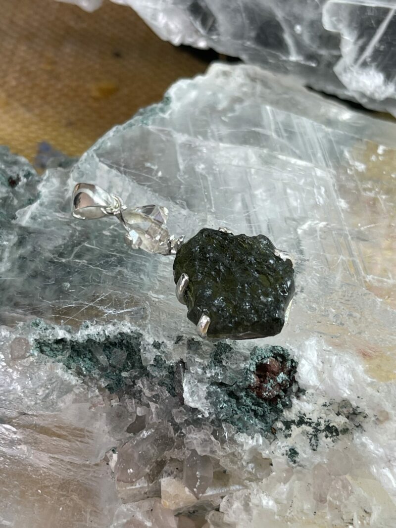 this is magnificent moldavite with herkimer diamond silver pendant thecrystalcave.com.au