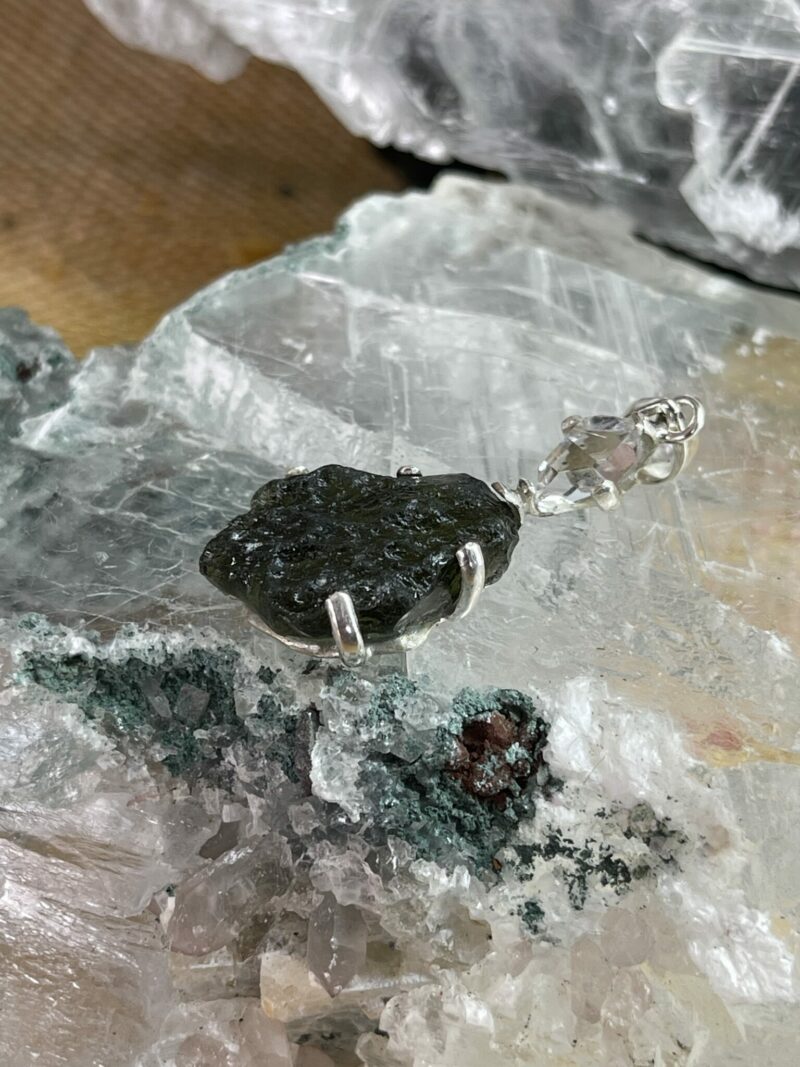 this is magnificent moldavite with herkimer diamond silver pendant thecrystalcave.com.au