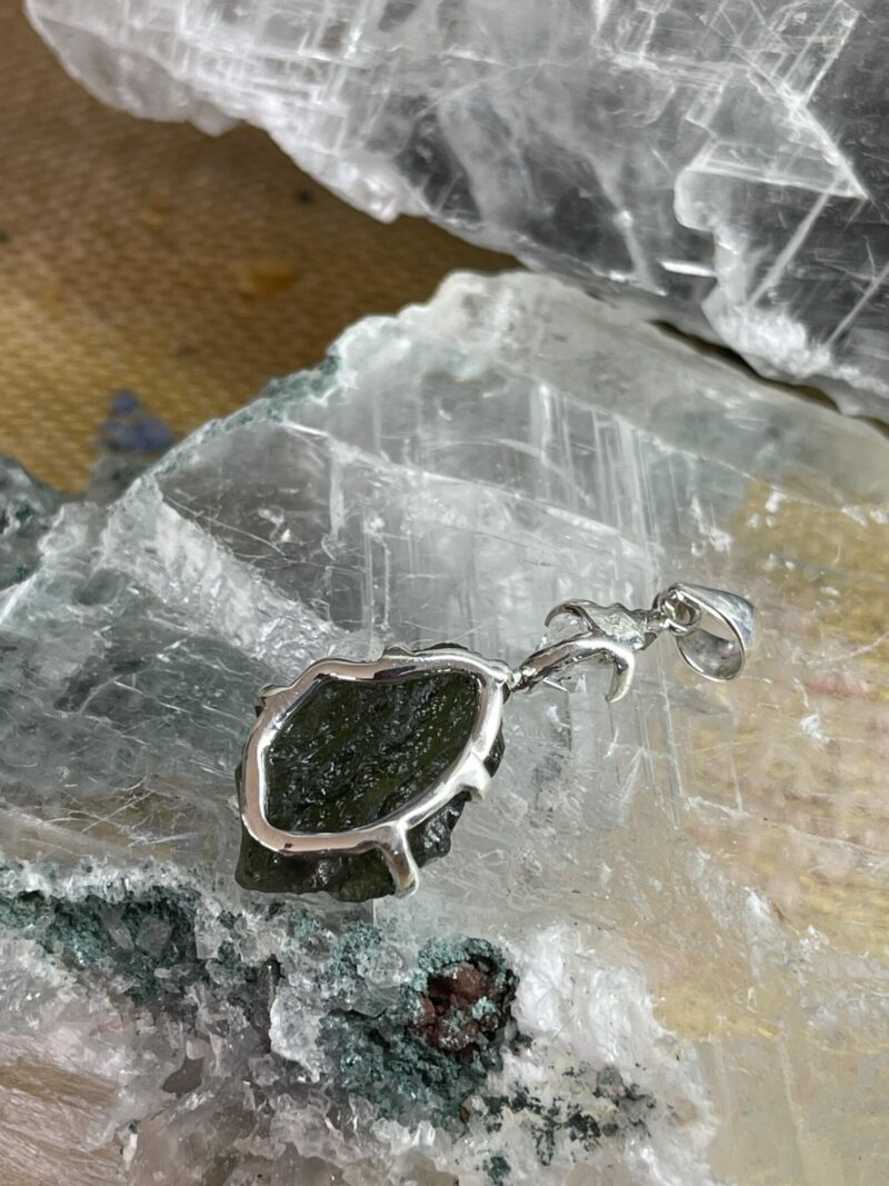 this is magnificent moldavite with herkimer diamond silver pendant thecrystalcave.com.au