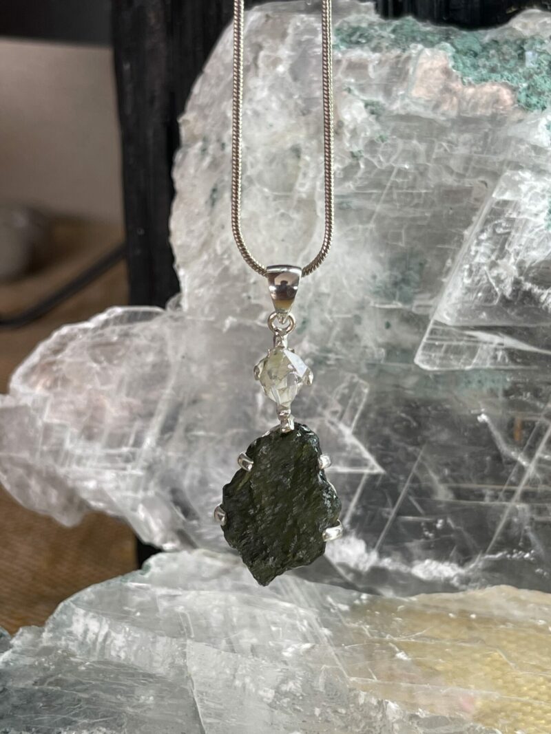 this is magnificent moldavite with herkimer diamond silver pendant thecrystalcave.com.au