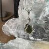 this is magnificent moldavite with herkimer diamond silver pendant thecrystalcave.com.au