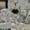 this is magnificent moldavite with herkimer diamond heart shaped silver pendant thecrystalcave.com.au