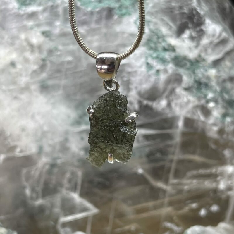 This is magnificent moldavite pendant set in 927 stirling silver thecrysalcave.com.au