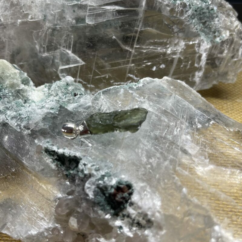 This is magnificent moldavite pendant set in 927 stirling silver thecrysalcave.com.au