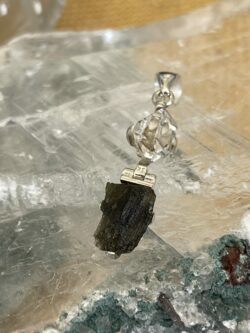 This is a Moldavite and herkimer pendant, set in 925 Stirling silver. thecrystalcave.com.au