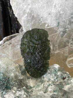 This is a specimen of a rare and beautiful Moldavite thecrystalcave.com.au