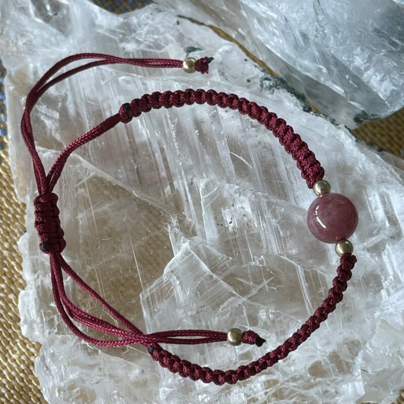 This is strawberry quartz hand woven bracelet