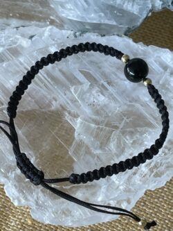 this is black obsidian and cotton hand woven bracelet