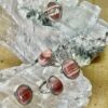 This is a selection of Rhodochrosite rings, oval cut cabochons set in 925 stirling silver. thecrystalcave.com.au
