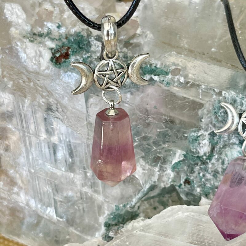 This is a fluorite pendant with triple goddess and pentacle. for connection and protection thecrystalcave.com.au