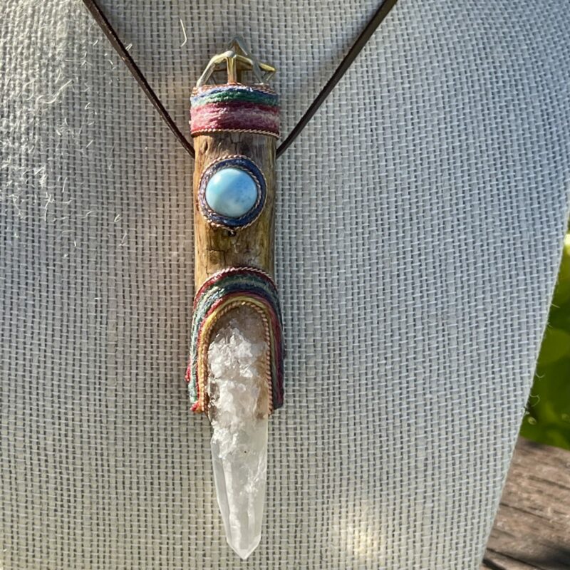This is magnificent talisman holding ancient wisdom with larimar sphere at its heart, brass merabah on top and completed with ancient clear master quartz
