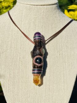 This is Talisman of Protective Guidance with sugilite citrine aquamarine and shungite sphere