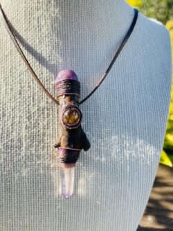 This is a very special talisman of helaing with gold rutile sphere, sugilite sphere and vera cruz amethyst