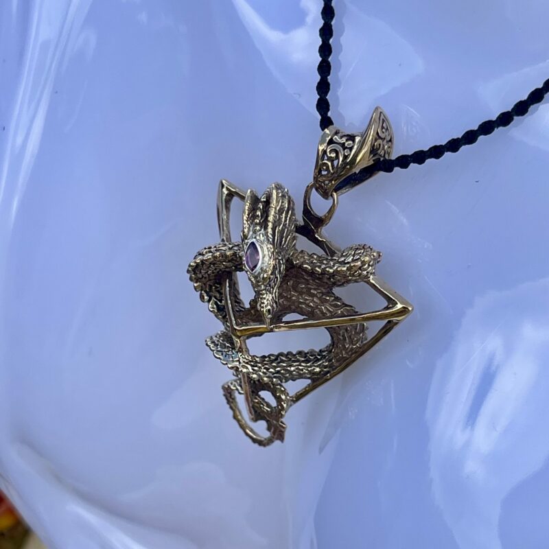This is Tetrahedron sacred geometry bronze ruby dragon necklace