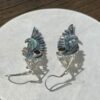 These are Garnet Hyper Tetra sacred geometry abelony wing earrings