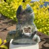 This is Moss Agate Geode Cat Carving – A Touch of Nature’s Magic