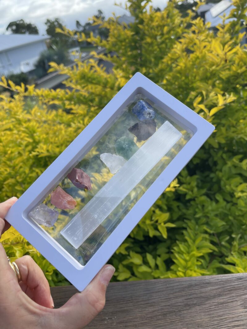 This is Boxed Selenite Stick with 7 Raw Chakra Crystals