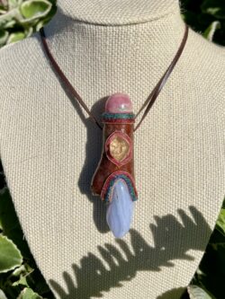 This is Talisman of Calm Love with blue lace agate, herkimer diamond and rhodocrosite sphere