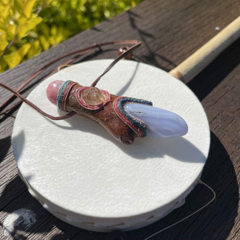 This is Talisman of Calm Love with blue lace agate, herkimer diamond and rhodocrosite sphere