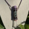 this is Talisman of Higher Connection with phoshosiderite sphere, seraphinite and angel aura lemurian point