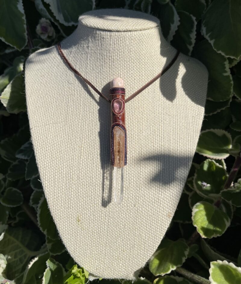 This isTalisman of Clear Empath with rohodocrosite, rose quartz, columbian lemurian blade of light quartz