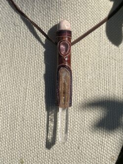 This isTalisman of Clear Empath with rohodocrosite, rose quartz, columbian lemurian blade of light quartz