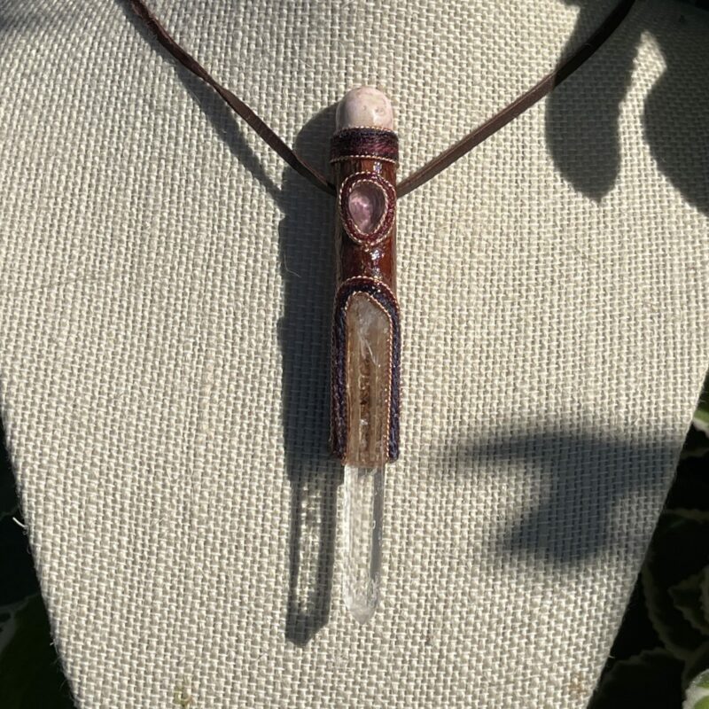 This isTalisman of Clear Empath with rohodocrosite, rose quartz, columbian lemurian blade of light quartz